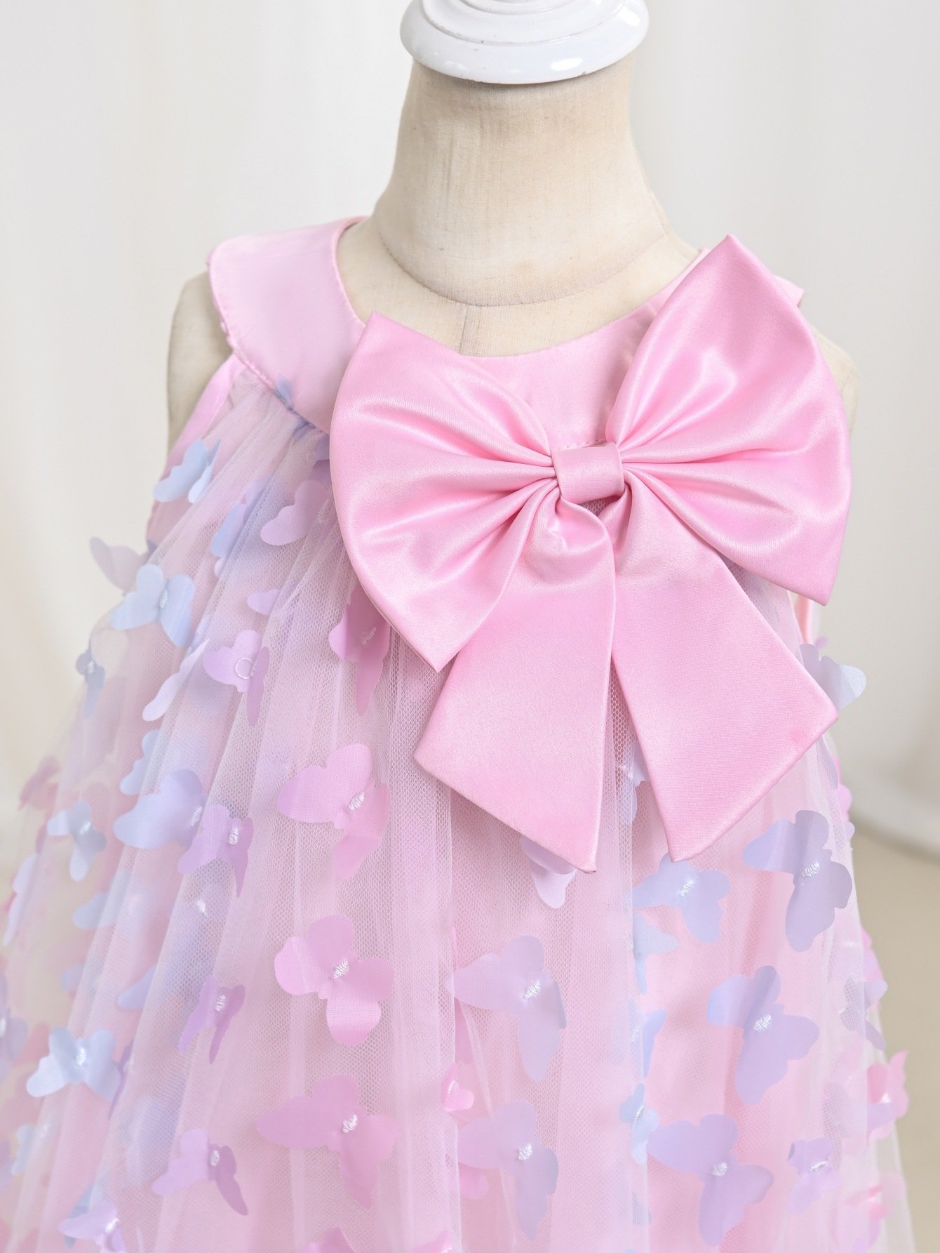 Girls butterfly princess dress — back view with oversized bow